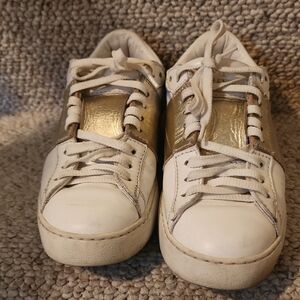 Valentino Garavani Open low-top leather sneakers with gold-tone panels